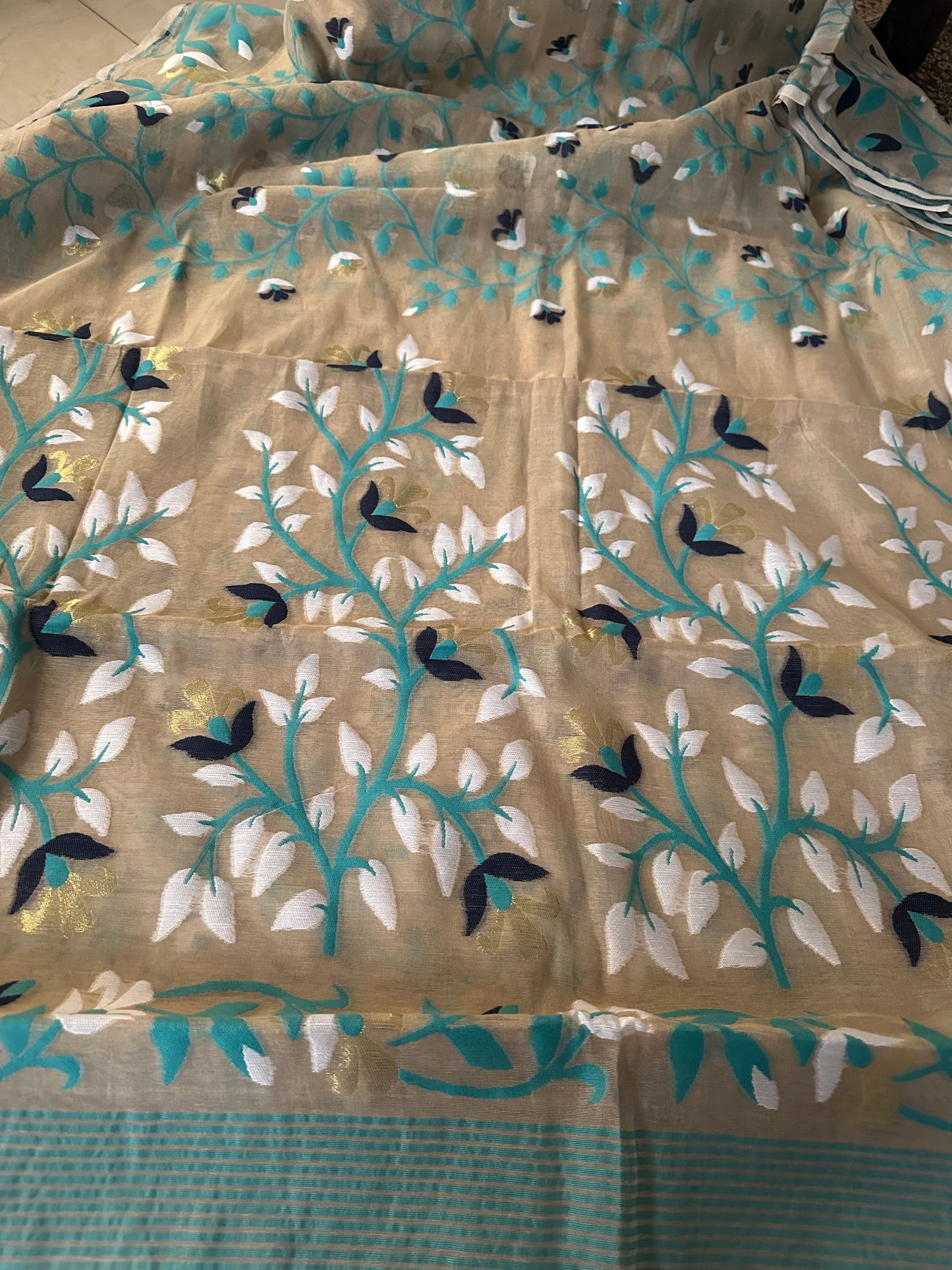 Nude Cotton Silk Jamdani Saree with Blue Floral Design & Zari Work