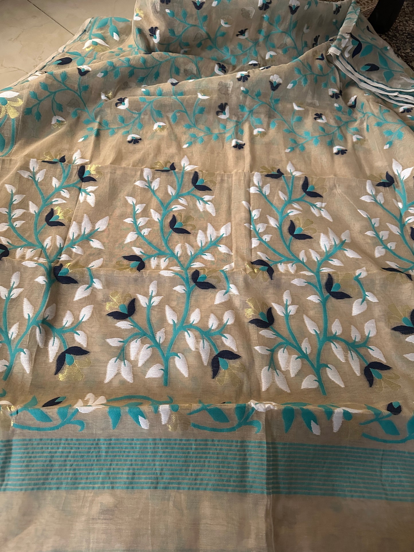 Nude Cotton Silk Jamdani Saree with Blue Floral Design & Zari Work