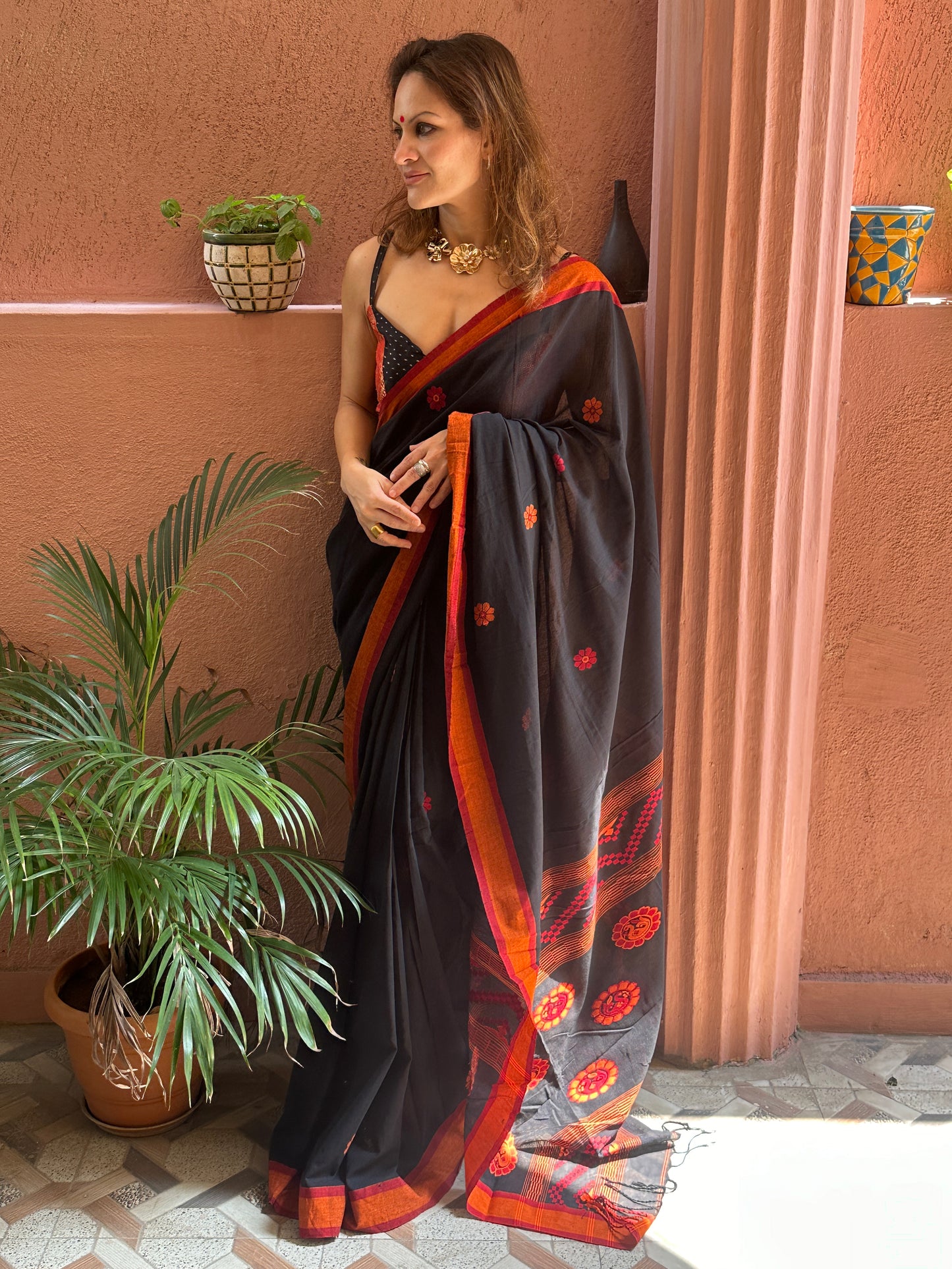 Black Baluchari Sari with Handwoven Design, Floral Butis, & Zari Border