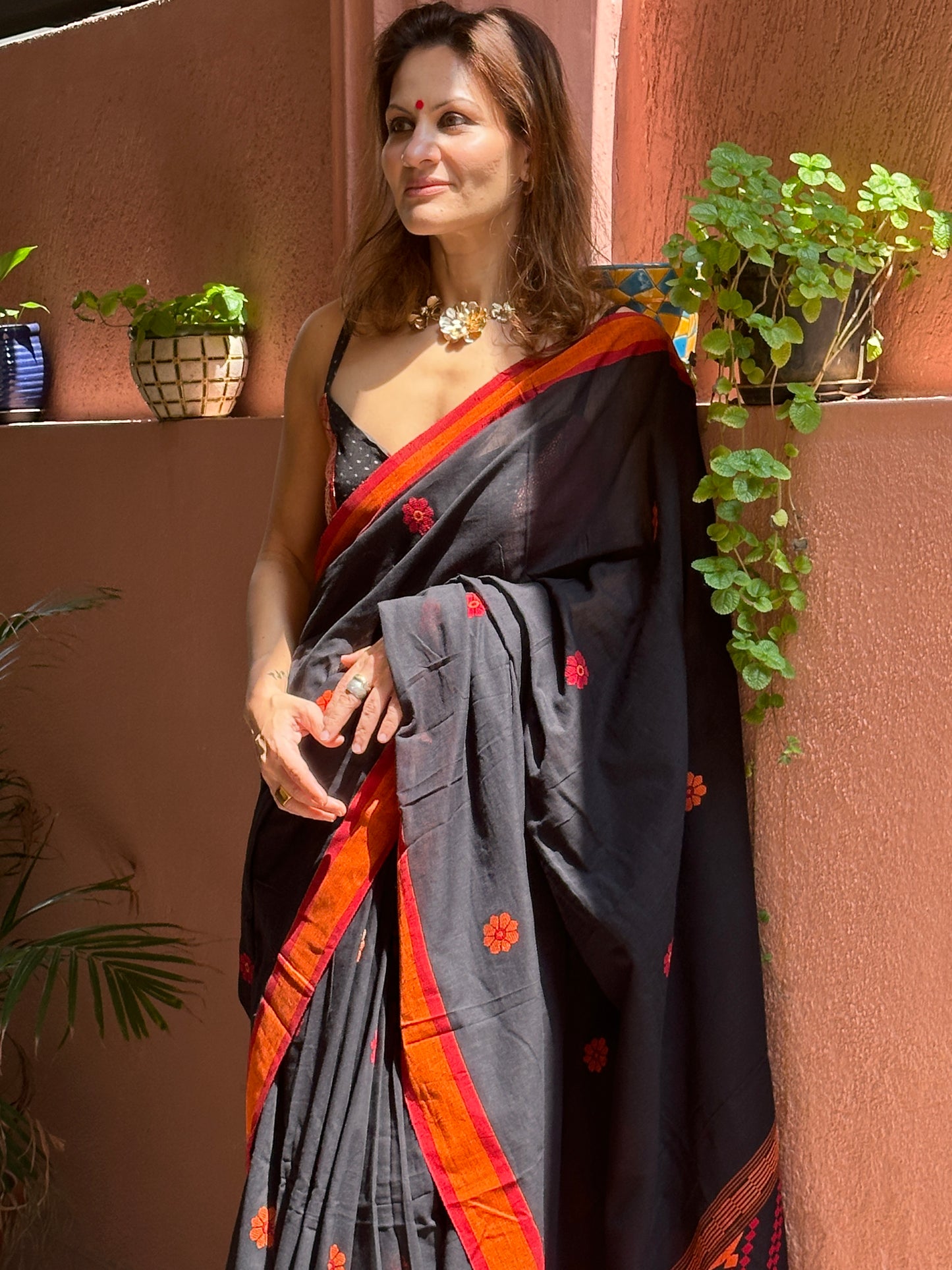 Black Baluchari Sari with Handwoven Design, Floral Butis, & Zari Border