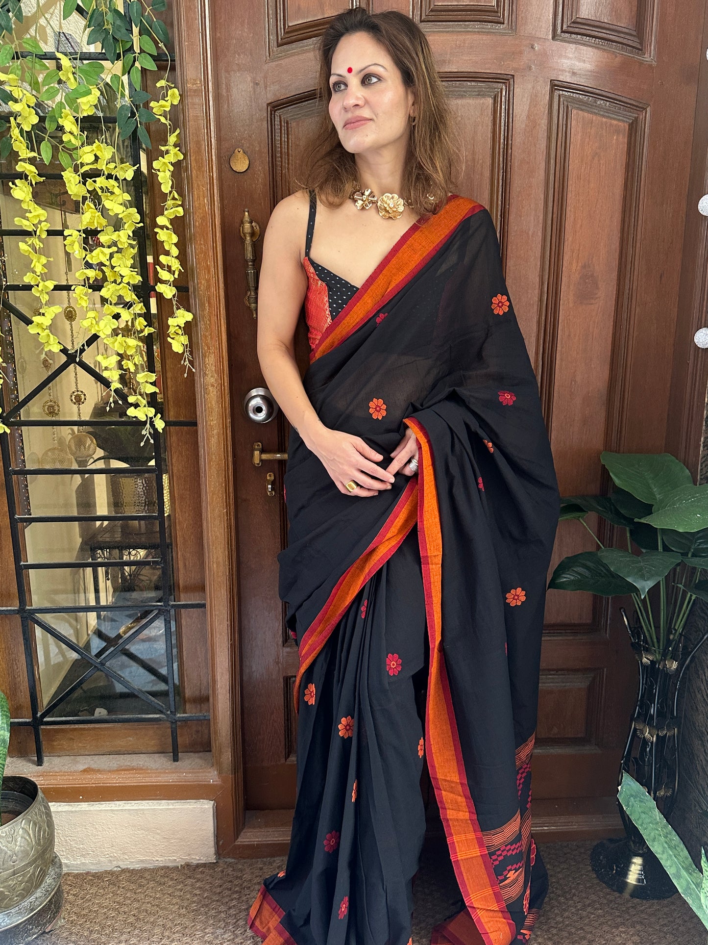 Black Baluchari Sari with Handwoven Design, Floral Butis, & Zari Border